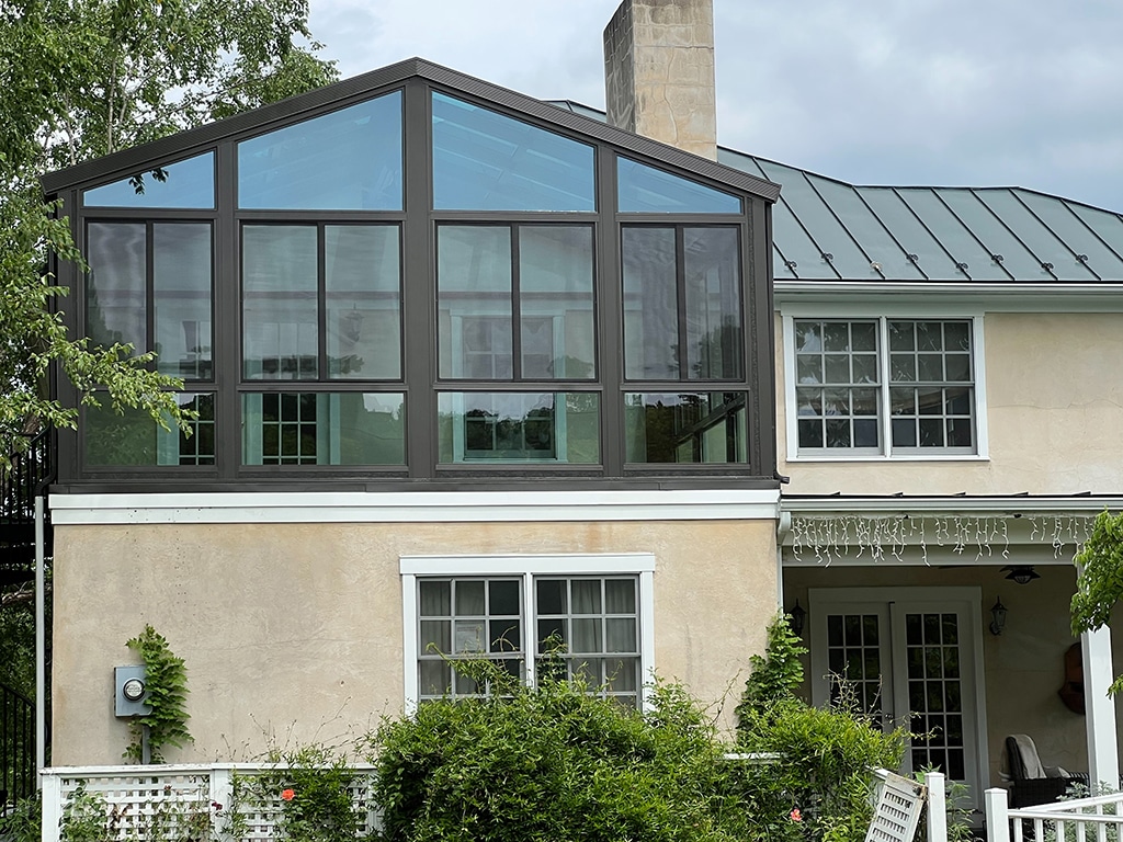 Can I add a bathroom or kitchen to my sunroom?